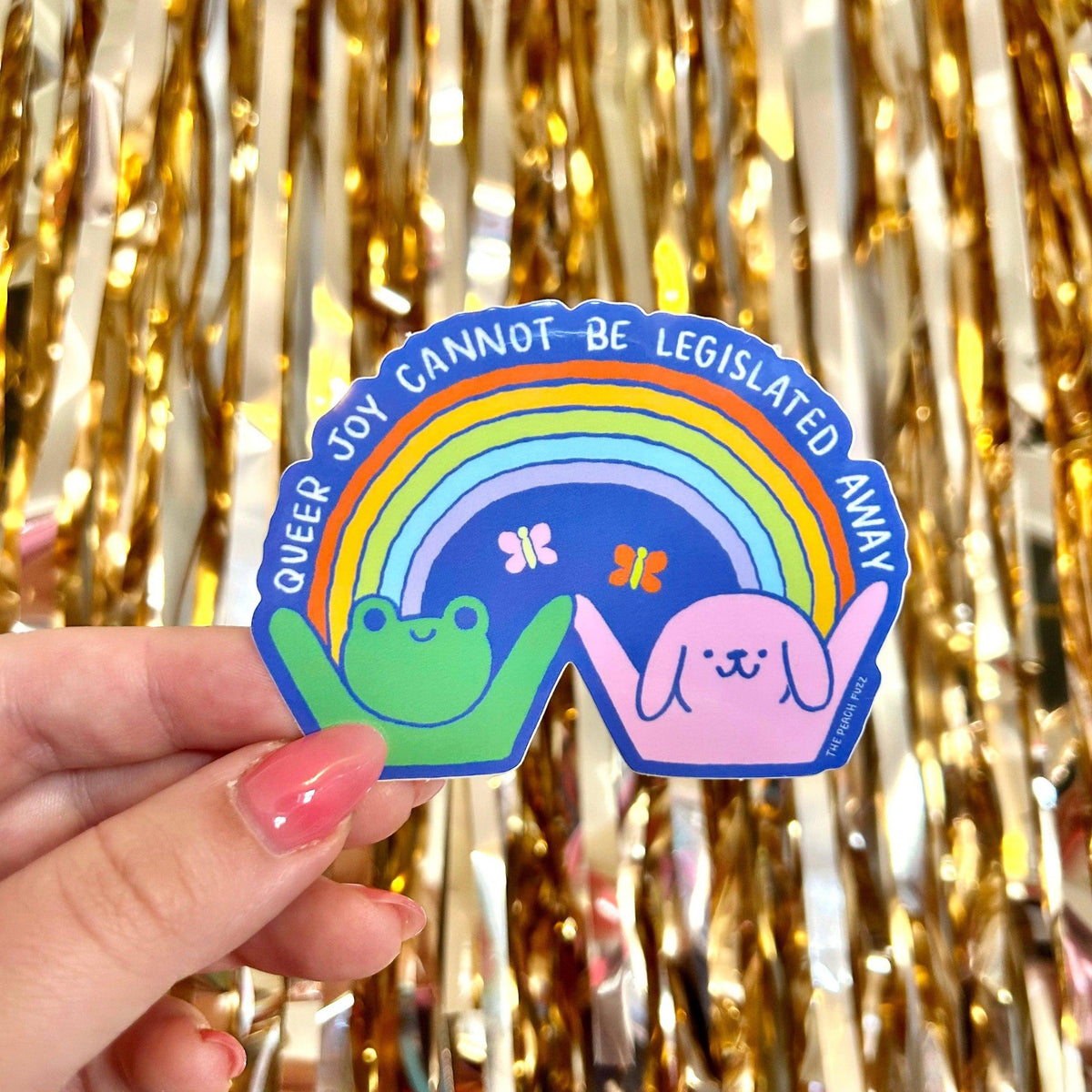 The Peach Fuzz-Queer Joy Cannot Be Legislated Away Sticker-accessory-gather here online