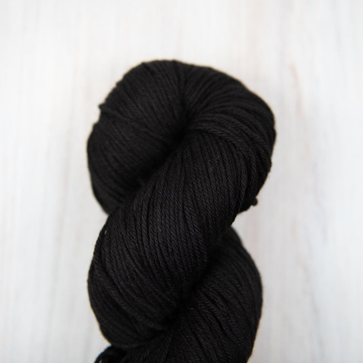 Malabrigo - Arroyo - 195 Black - gatherhereonline.sbs